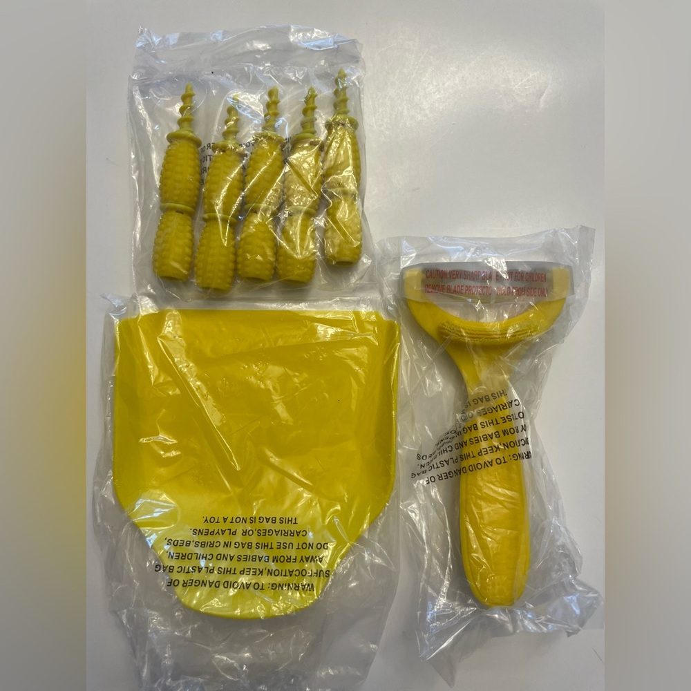 Kuhn Rikon Corn Zipper & Scraper with 10 Heat Resistant Corn Holders